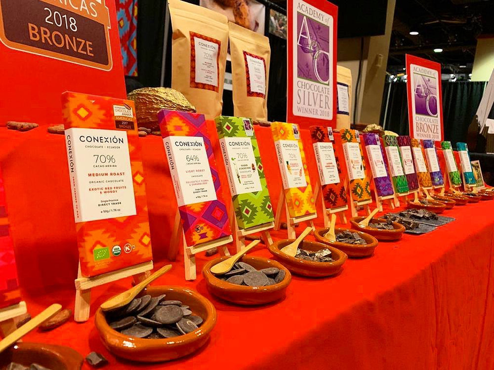 Conexion Chocolate booth displaying their range of award-winning chocolate products