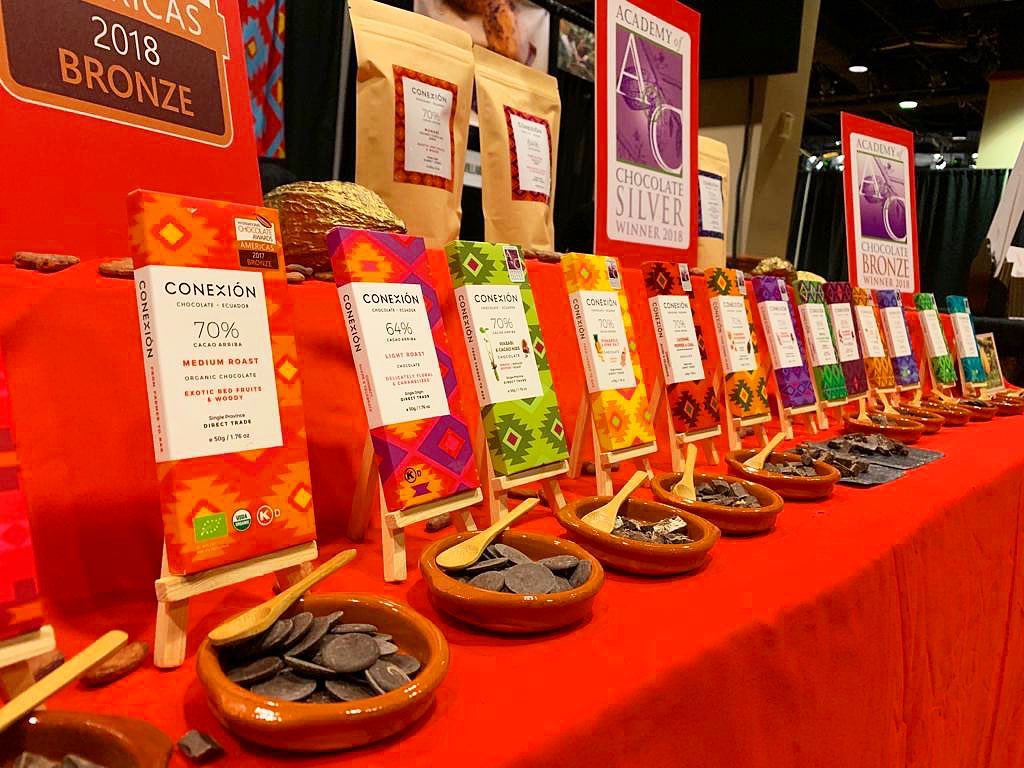 Conexion Chocolate booth displaying their range of award-winning chocolate products
