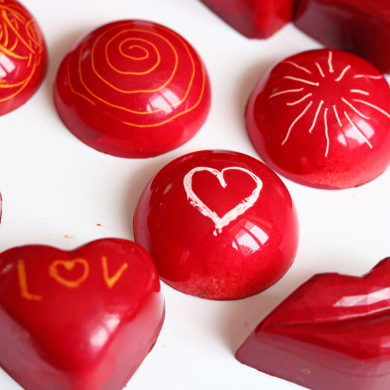 White Chocolate Bonbons with Strawberry Ganache Filling conexion-chocolates