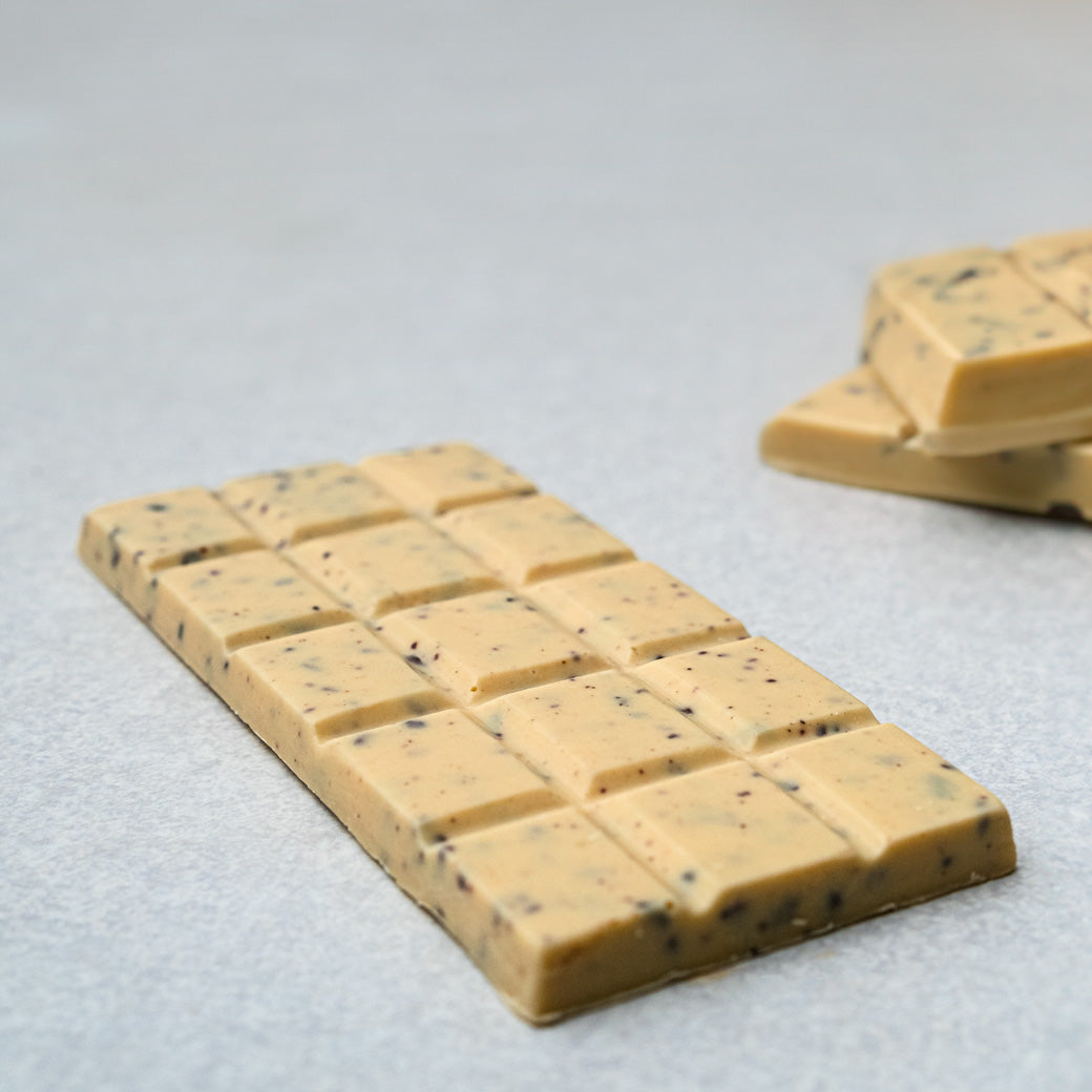 Sustainable White Chocolate and Cacao Nibs Bar made in Ecuador, direct trade.